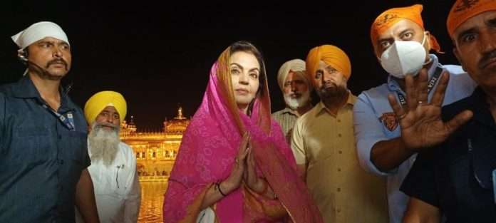 Nita Ambani bowed down